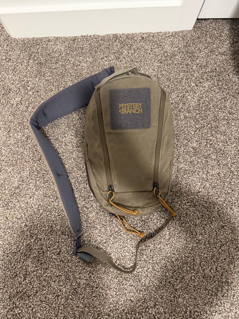 MYSTERY RANCH Olive Sling Pack with Gray Strap and Tan Cord Pulls